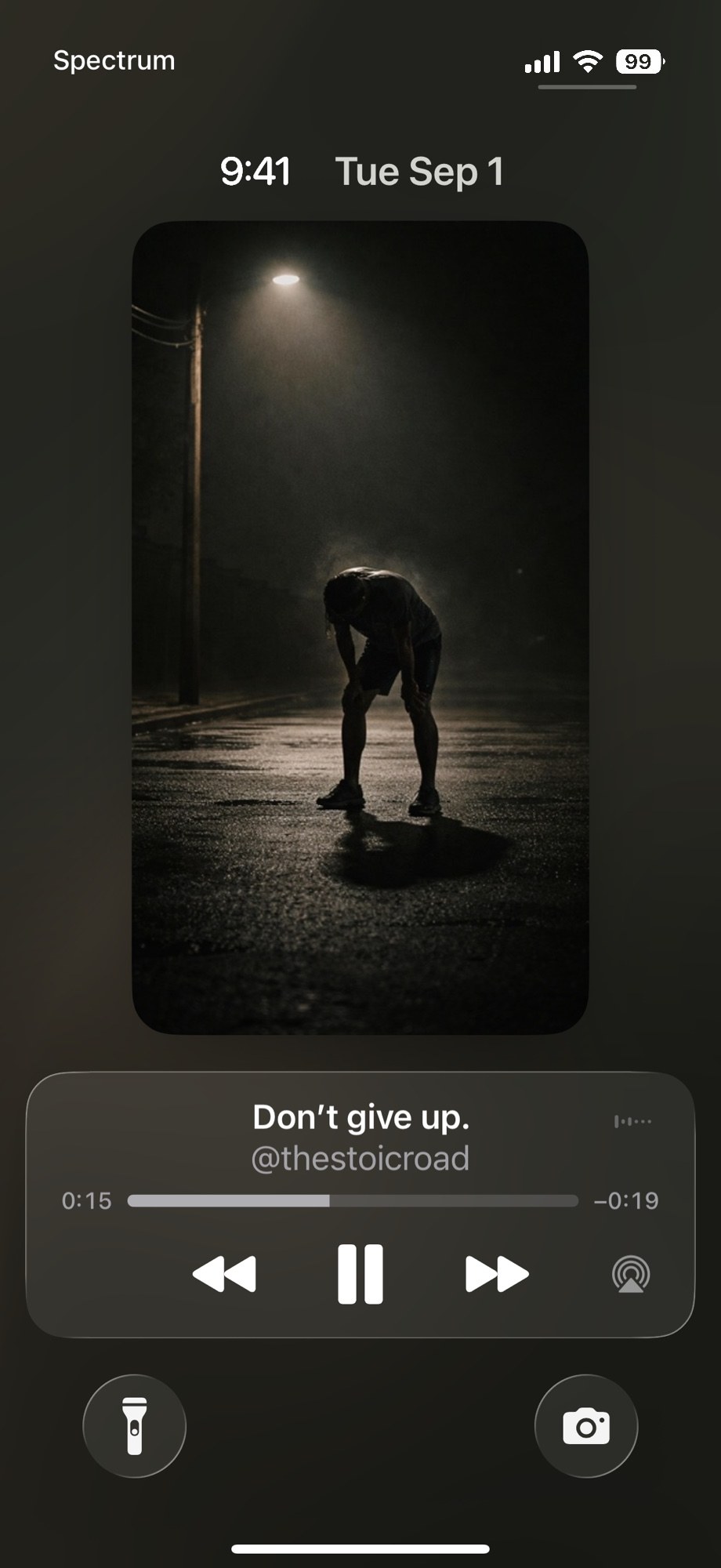 iPhone lock screen playing a Reelign reel with full media controls